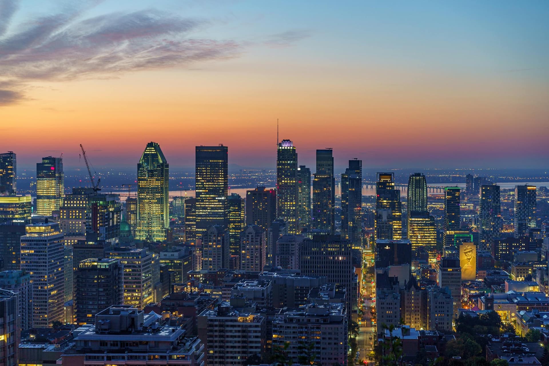 Downtown Montreal skyline at sunset, city served by Big G Electric